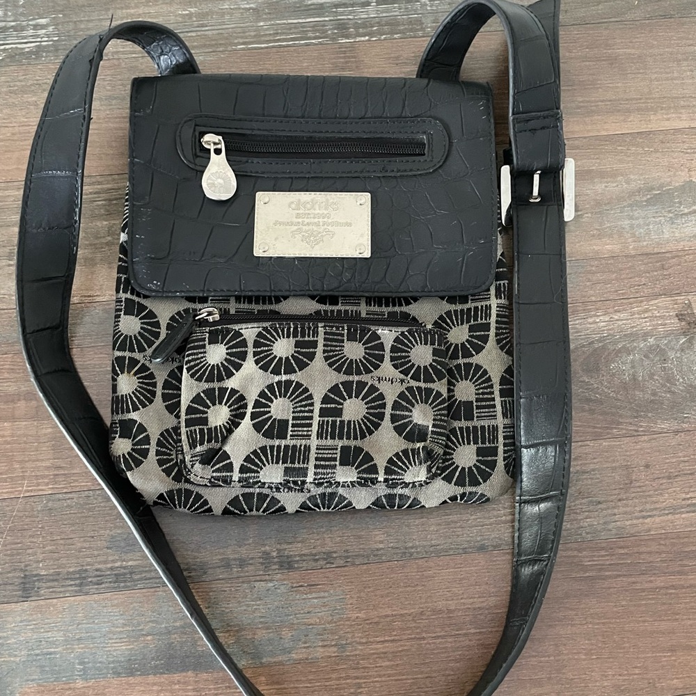Akdmks crossbody purse.